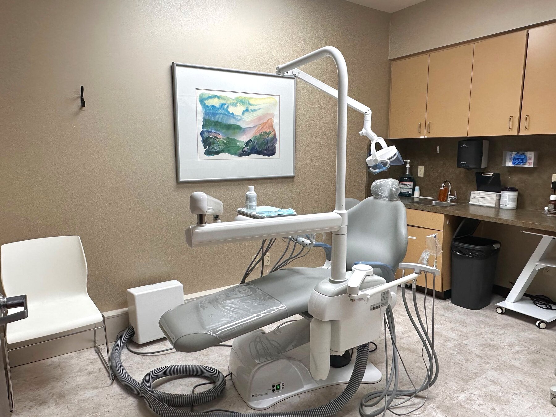Treatment room at OAKS Oral Surgery, with the surgical chair beside the window